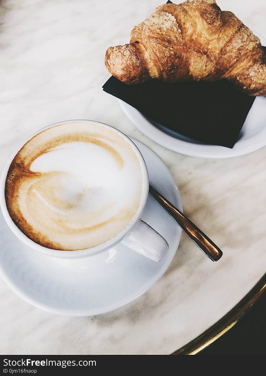 Cappuccino And A Croissant