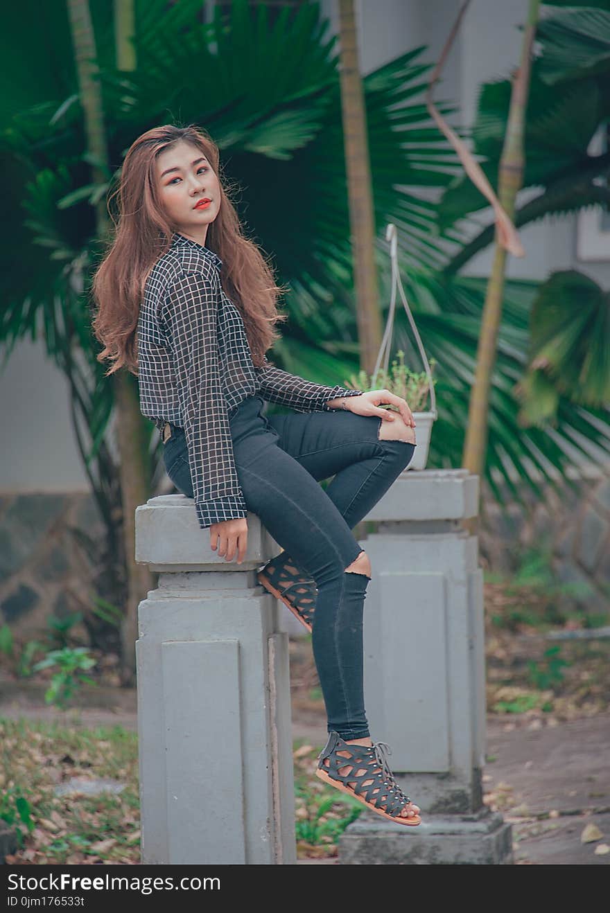 Woman Wears Black and White Checkered Sport Shirt