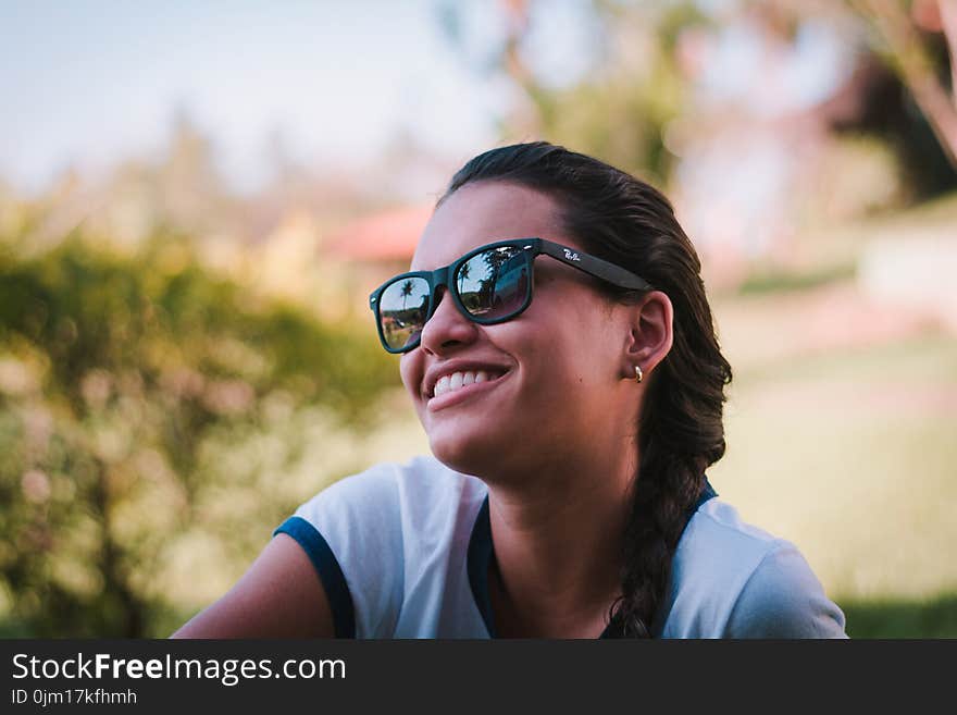 Woman Wearing Black Ray-ban Sunglasses