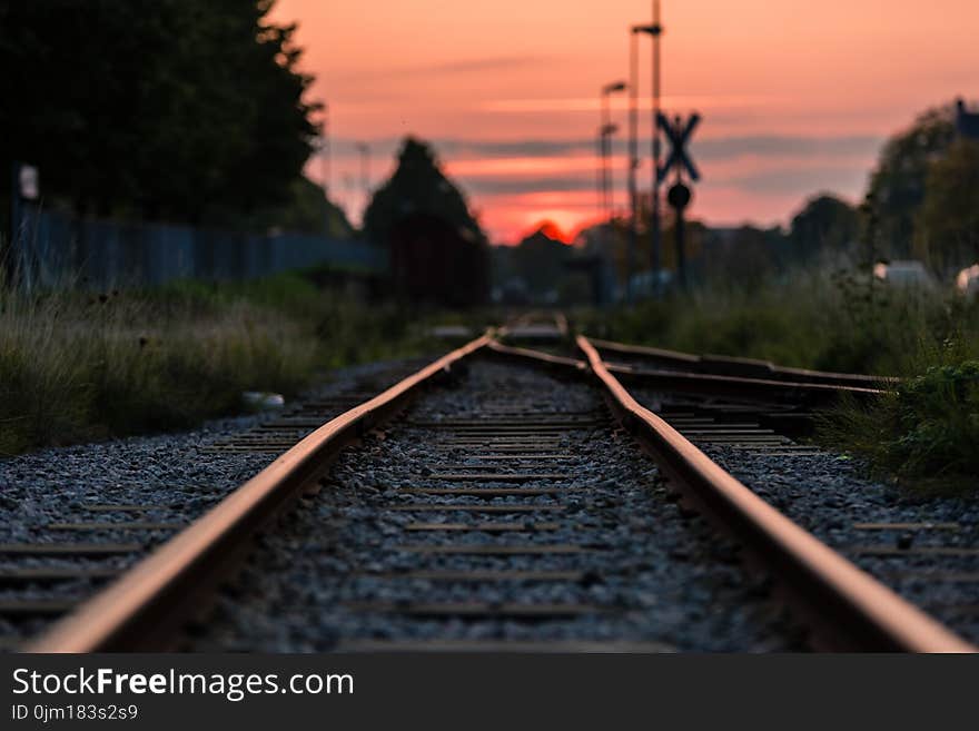 Shallow Focus Photography of Railway during Sunset