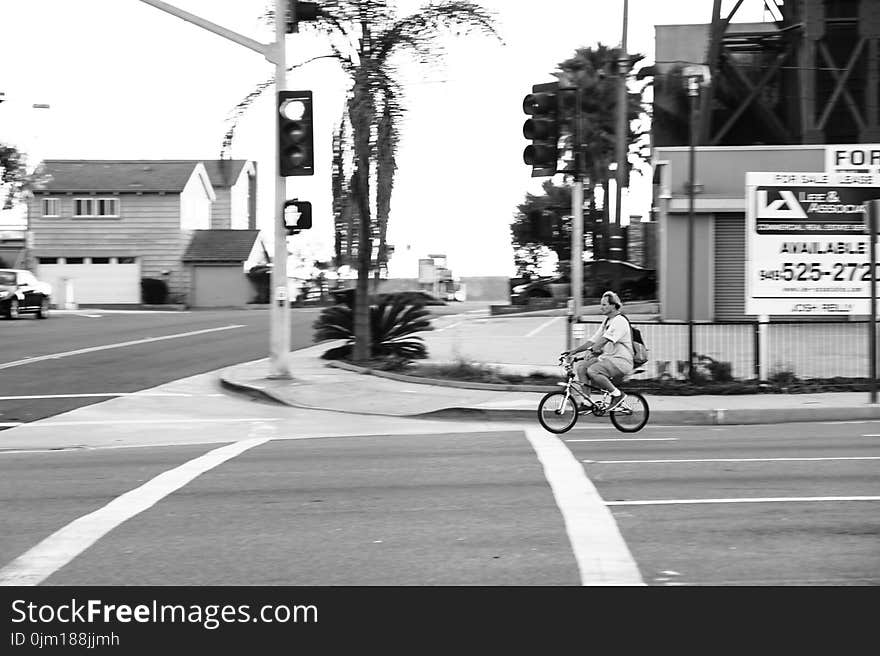 Man Riding Bicycle Photography