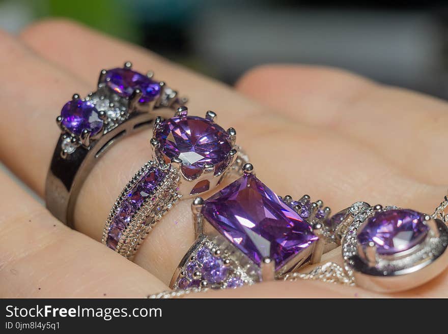 Fashion silver ring with purple zirconia, amethyst imitation.