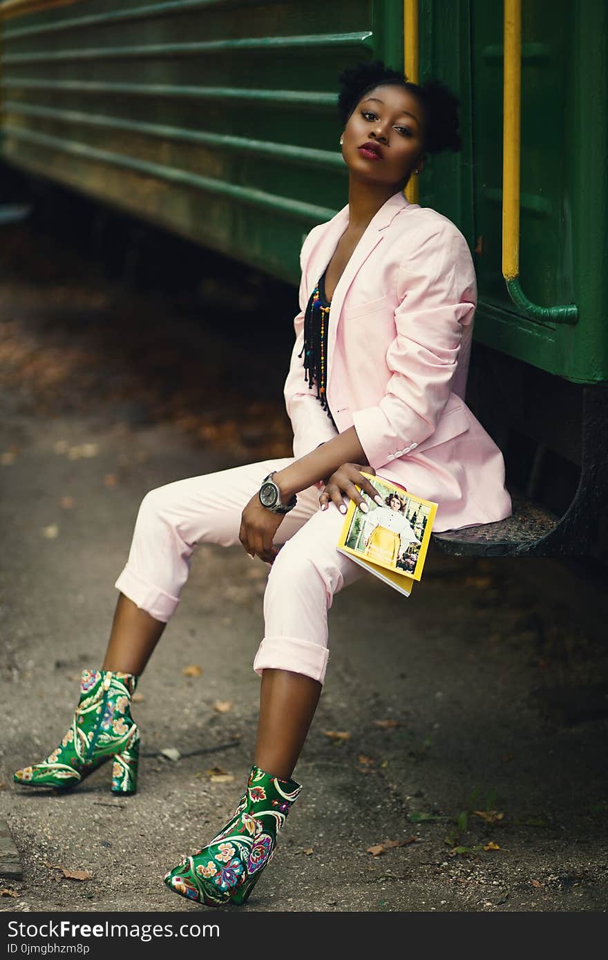 Woman in Pink 2-piece Dress Suit