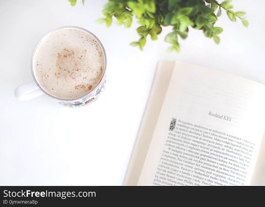 Flatlay Photography of Book and Cup