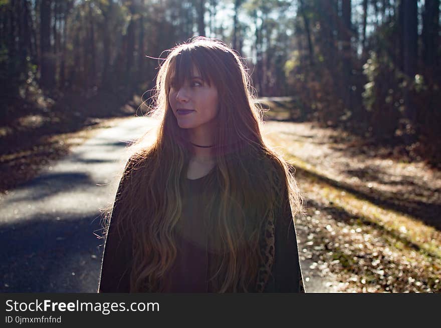 Photo of a Woman in the Forest