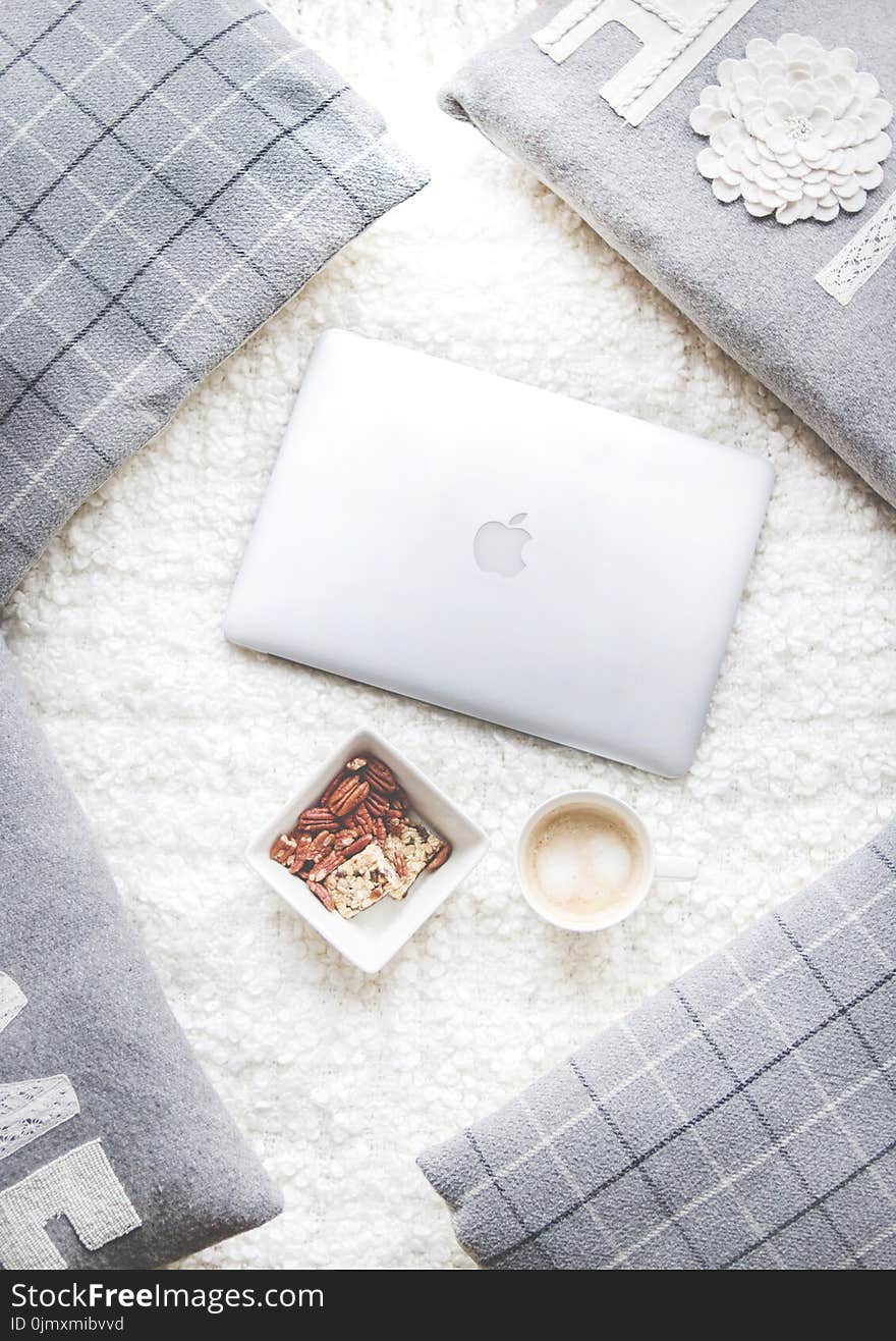 Flatlay Photography of Macbook and Snacks