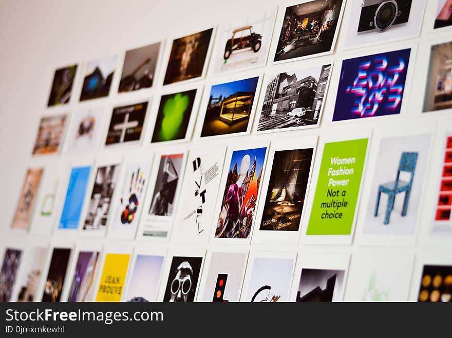 Close-up Photography of Photographs on the Wall