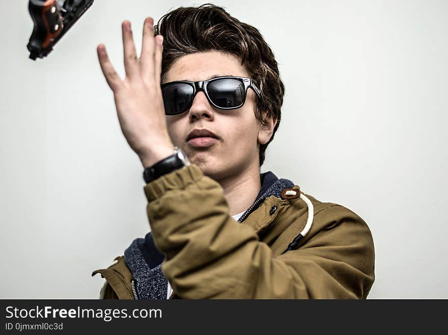 Photography of a Man Wearing Sunglasses