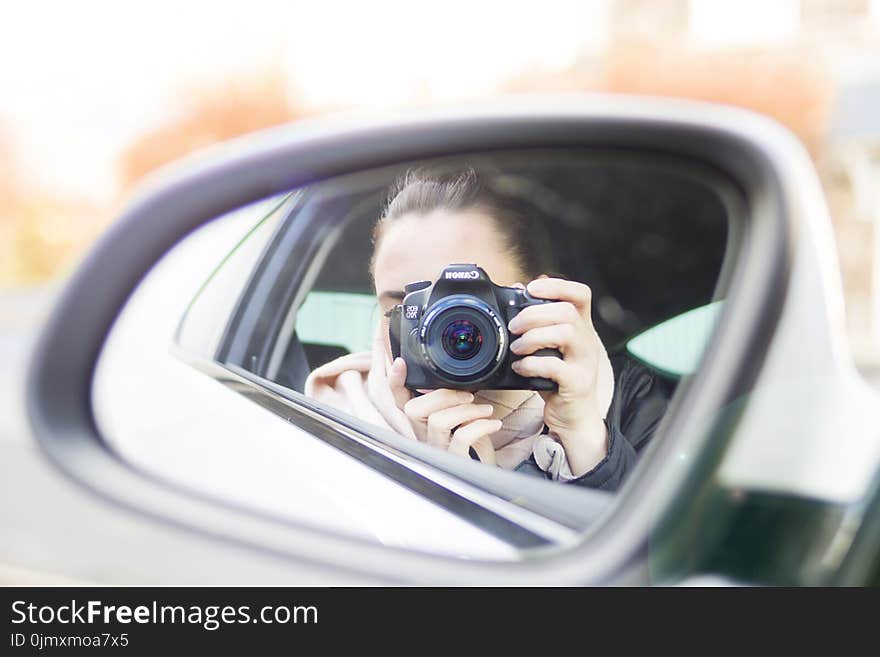 Close-up Photography of Woman Taking a Photo