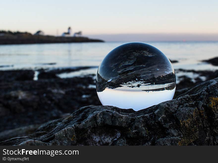 Clear Ball on Gray Rock