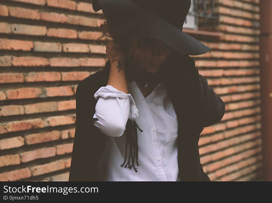 Woman Wearing White Dress Shirt and Black Coat