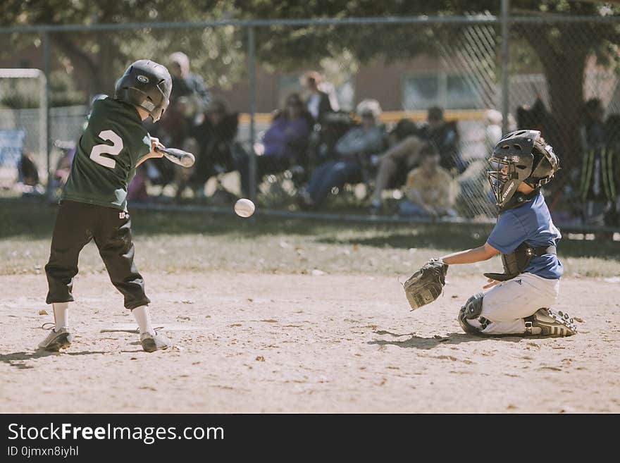 Two Children Playing Baseball