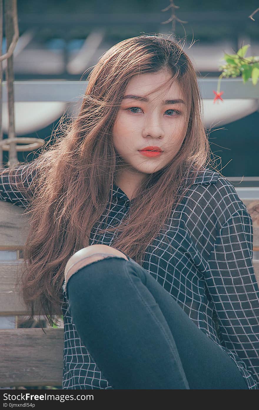 Woman Wearing Black and White Tatersall Button-up Long-sleeved Shirt