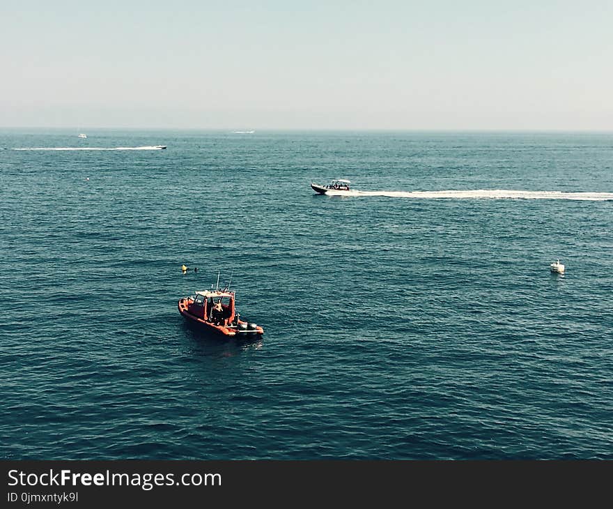 Two Boats on Calm Ocean Waters