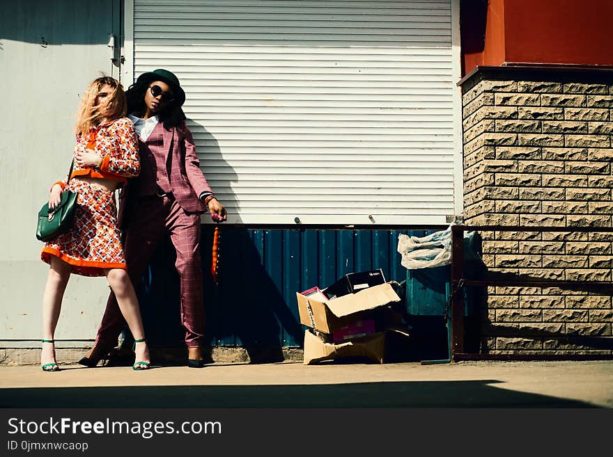 Woman in Orange Blazer