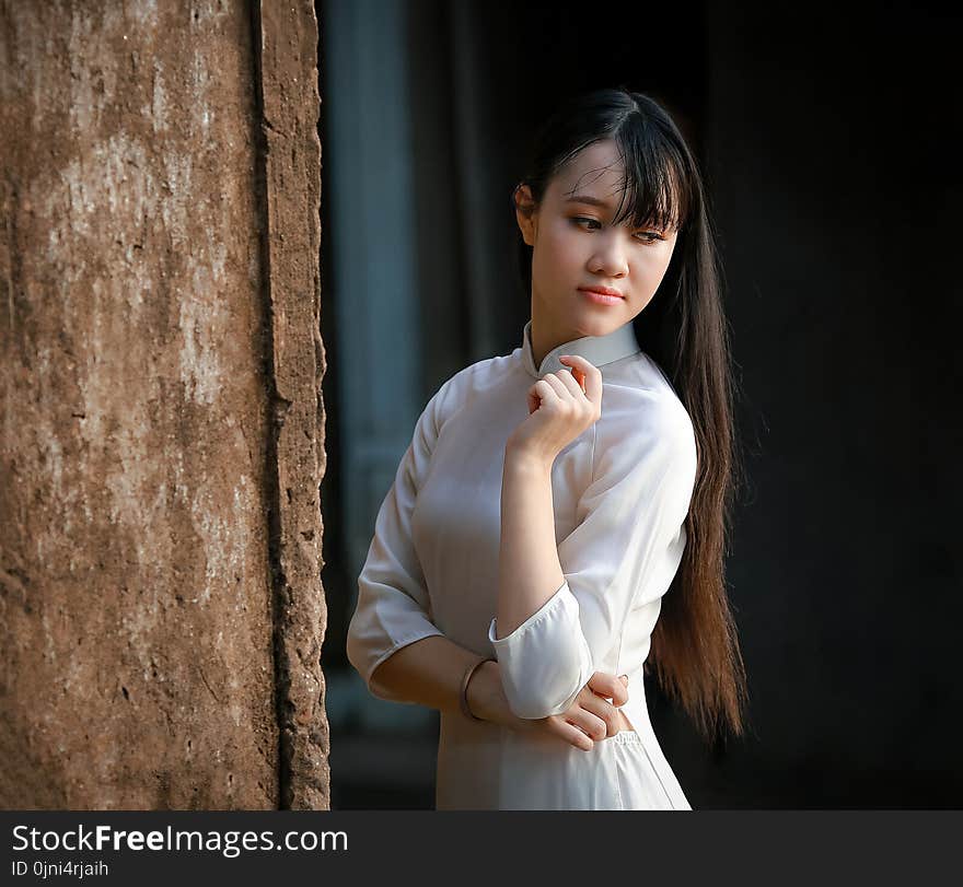 Women in White Long-sleeved Dress