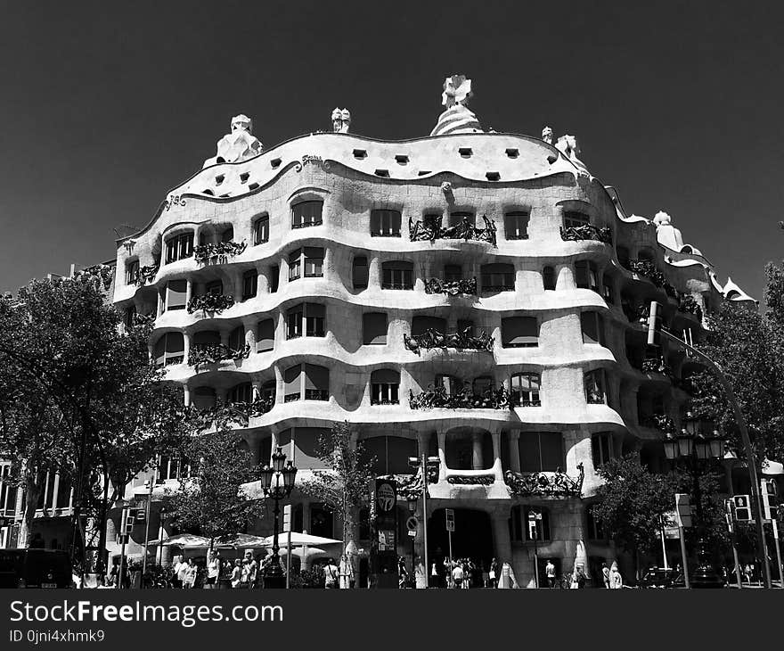 White Concrete Building in Grayscale Photography