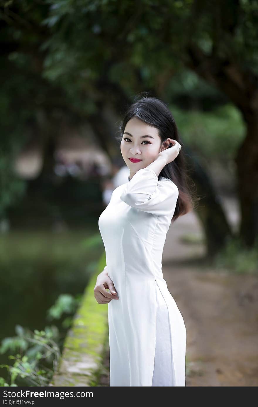 Woman Wearing White 3/4-sleeved Dress