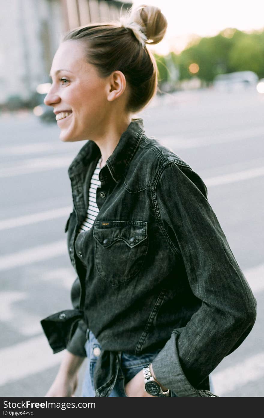 Selective Focus Photo of Woman Wearing Denim Jacket