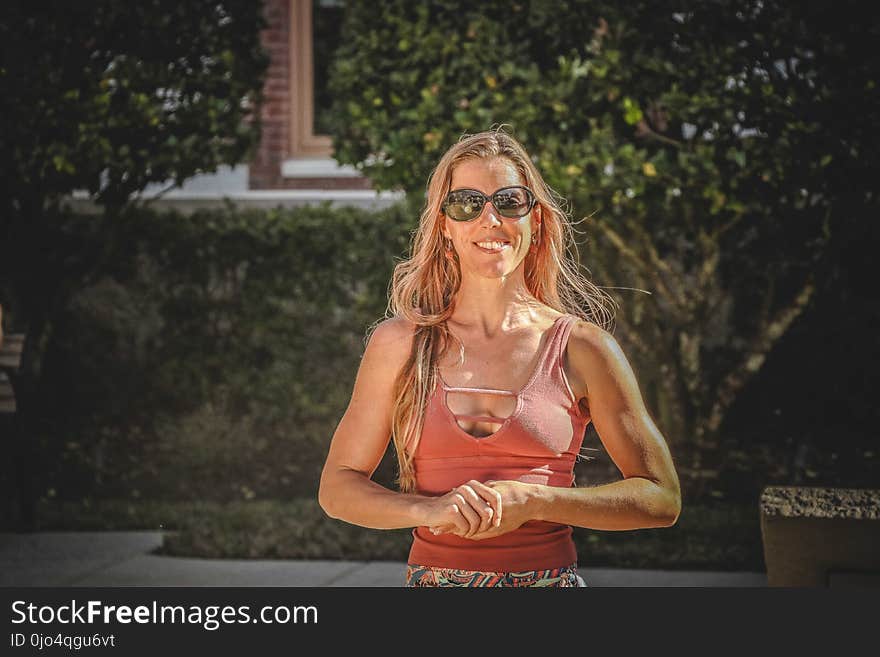 Woman Wearing Red Tank Top