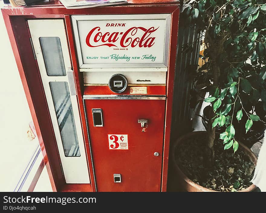 Red and White Coca-cola Vending Machine