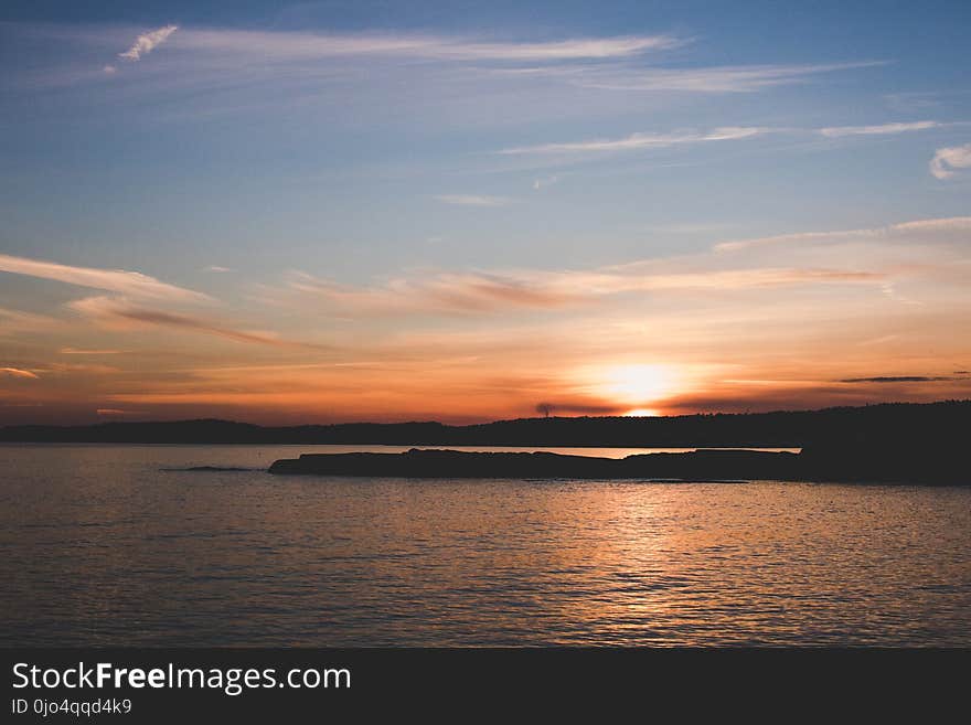 Body of Water during Sunset