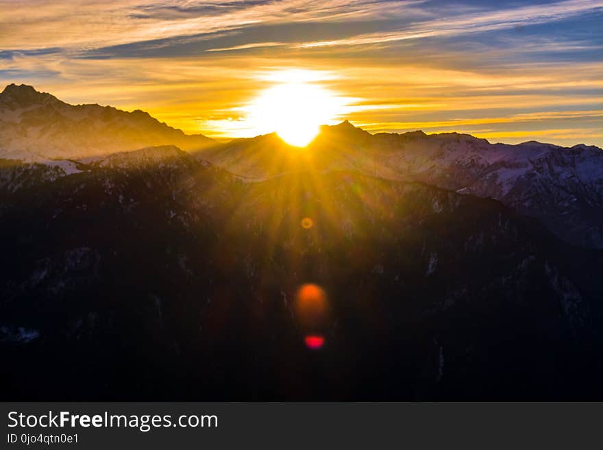 Silhouette of Mountains during Sunrise