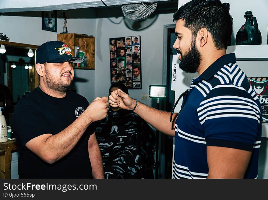 Two Bearded Man Giving Each Other Fist Bump