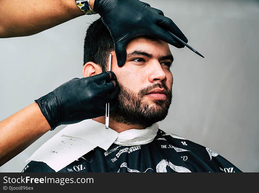 Man Taking Beard Shave