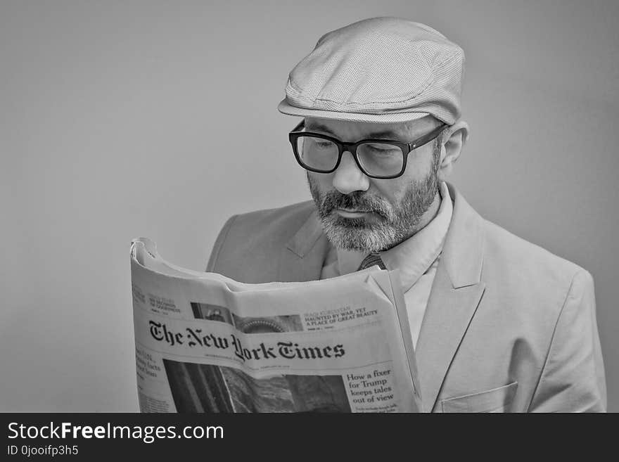 Man Reading a Newspaper