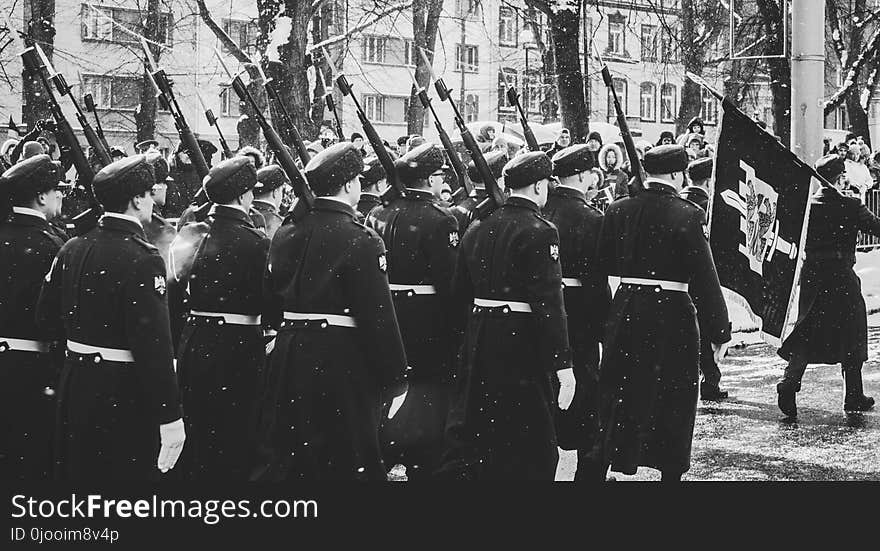 Grayscale Photo of Soldiers Matching