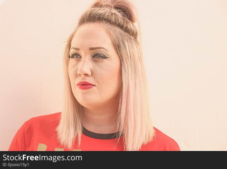 Woman With Tied Hair Wearing Red Top