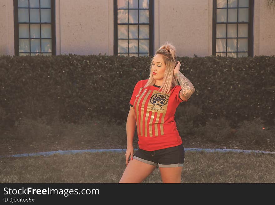 Woman With Red and Beige Crew-neck Shirt