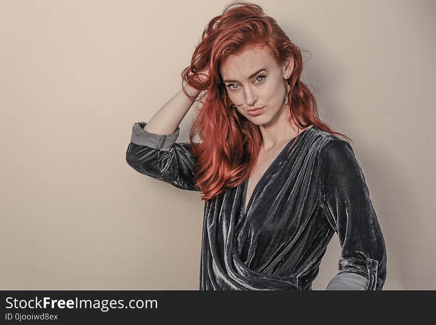 Red Haired Woman in Black Long-sleeved Top