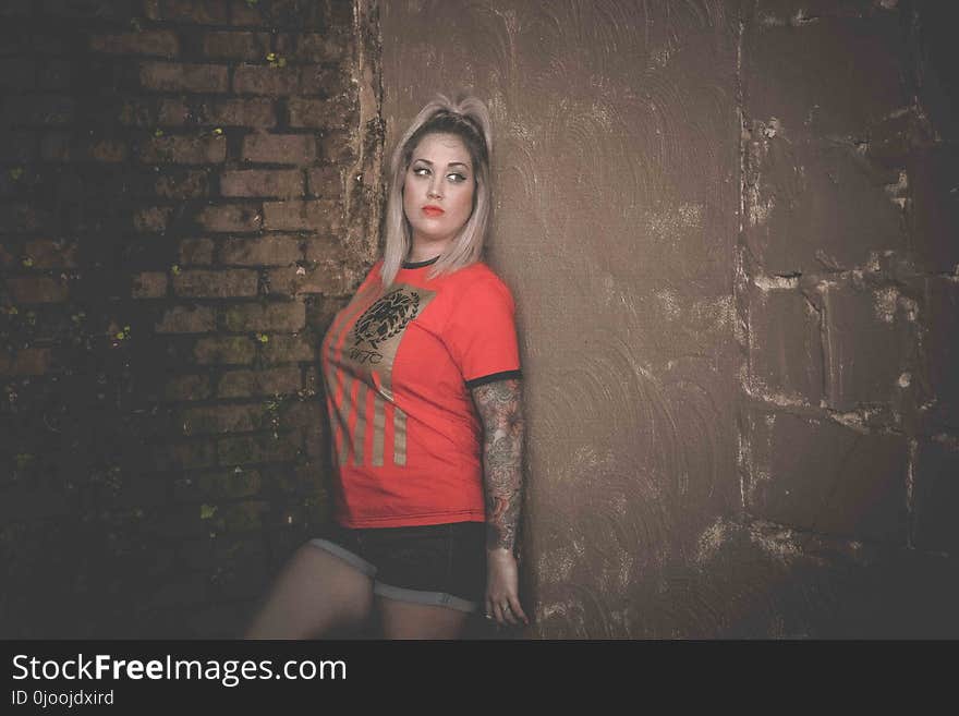 Woman Wearing Red and Black T-shirt