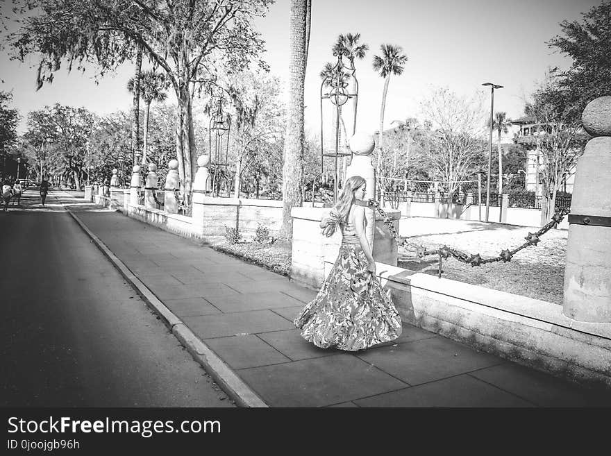 Grayscale Photo of Woman Wearing Dress