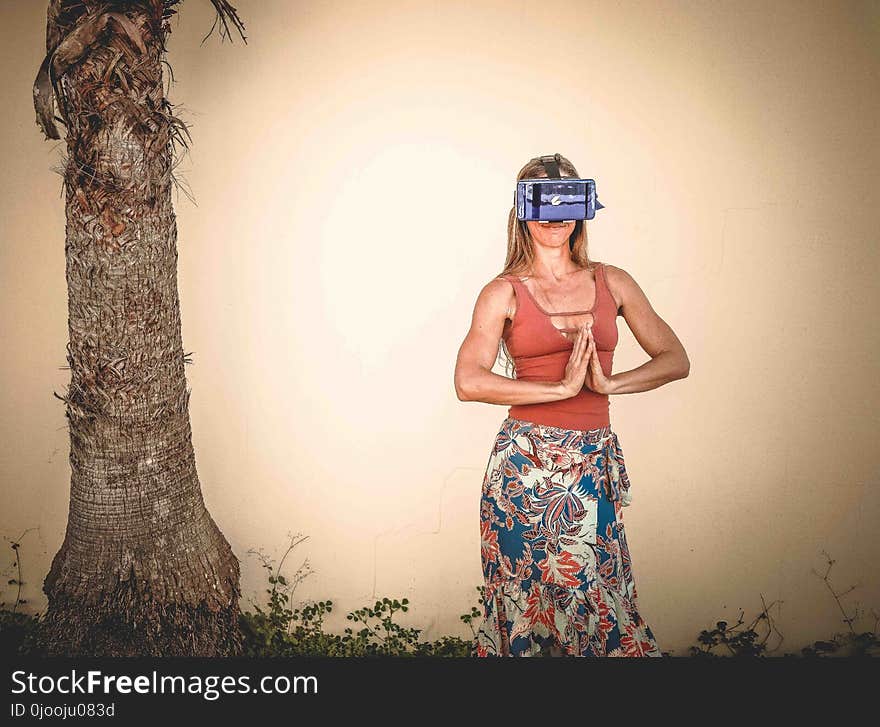 Woman Standing Wearing Brown Tank Top