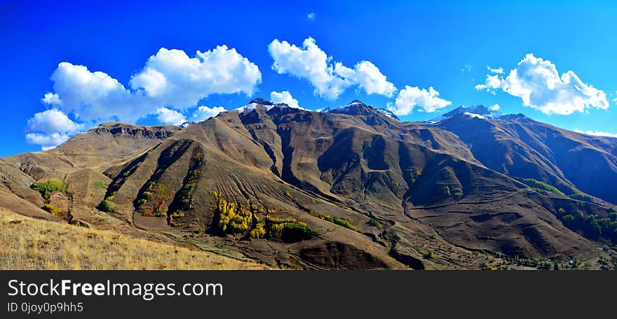 Sky, Mountainous Landforms, Mountain, Cloud