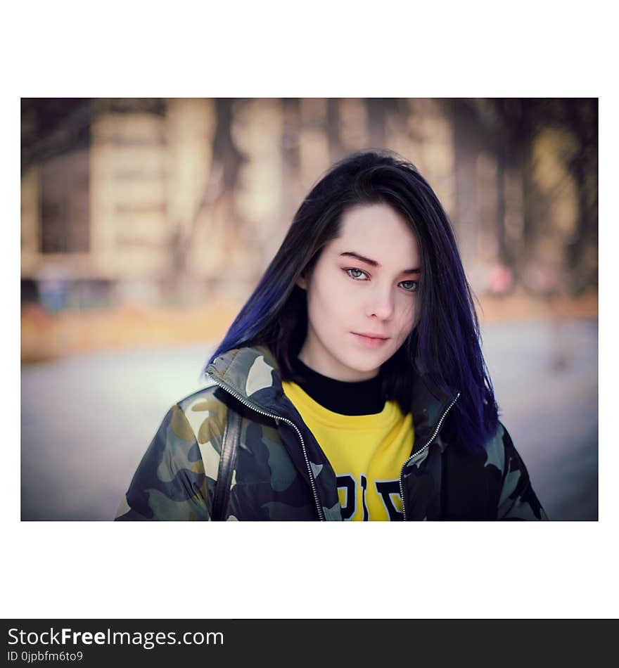 Black Haired Woman in Multicolor Camouflage Jacket