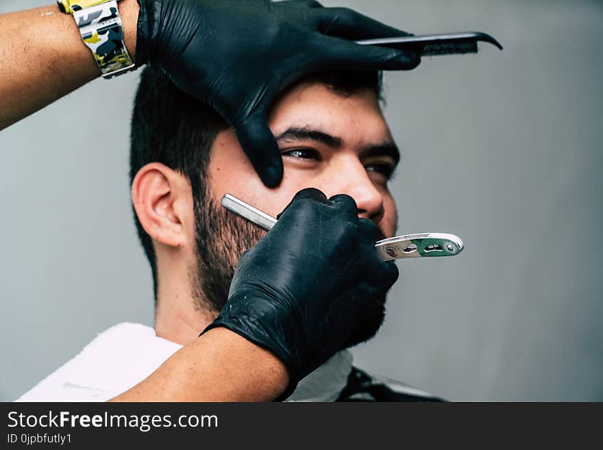 Person Shaving a Man&#x27;s Face With Straight Razor