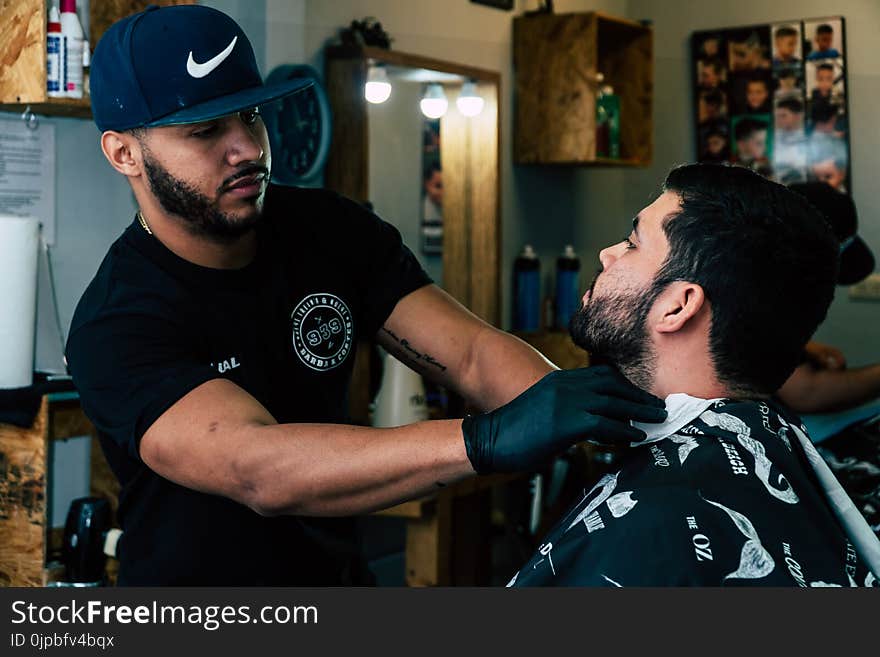 Barber Shaving His Costumer