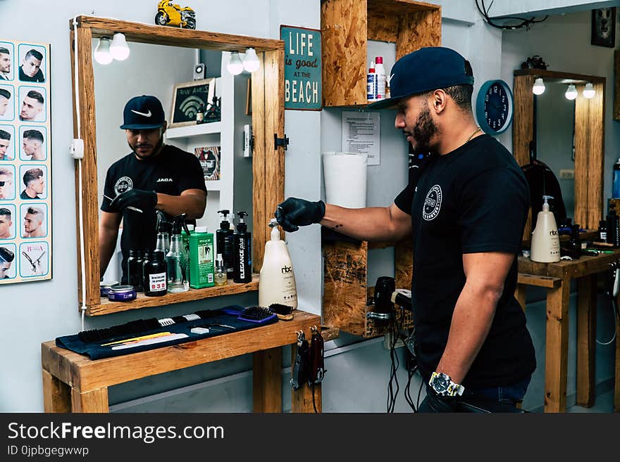 Man About to Hold Lotion Bottle