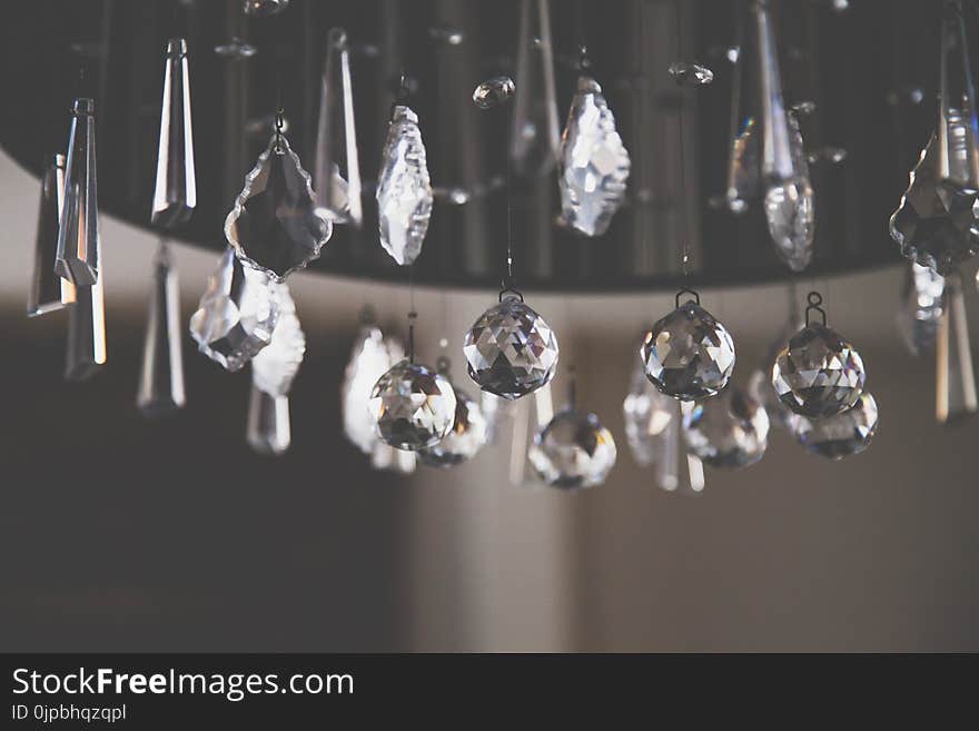 Closeup Photo of Clear Cut Glass Chandelier