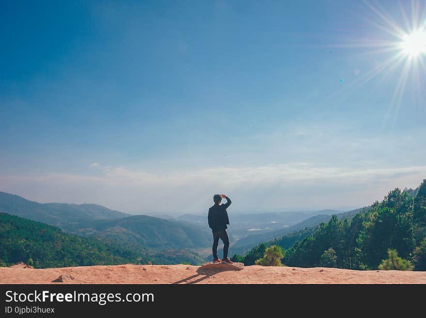 Man Looking on the Cliff