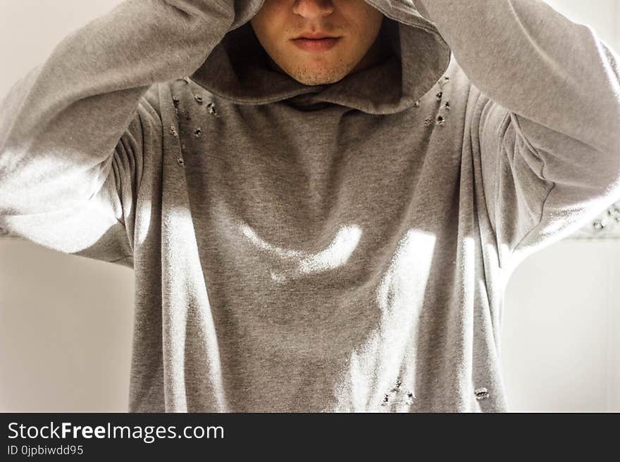 Man Wearing Gray Hoodie