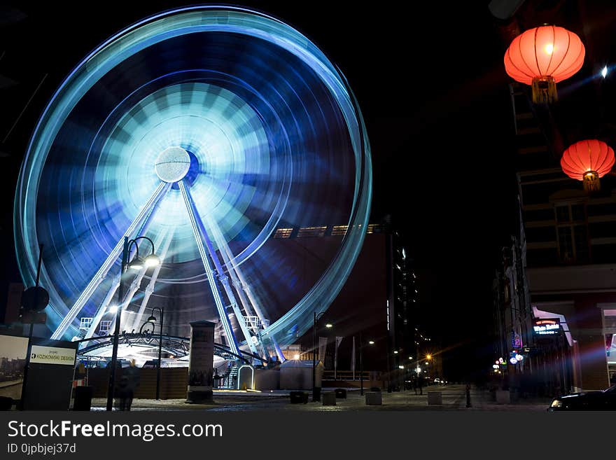 Time Lapse Photography of Blue Lighted Ferries Wheel