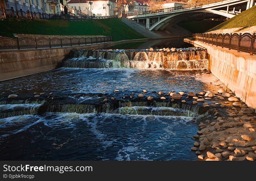 Waterfalls Near Bridge during Day