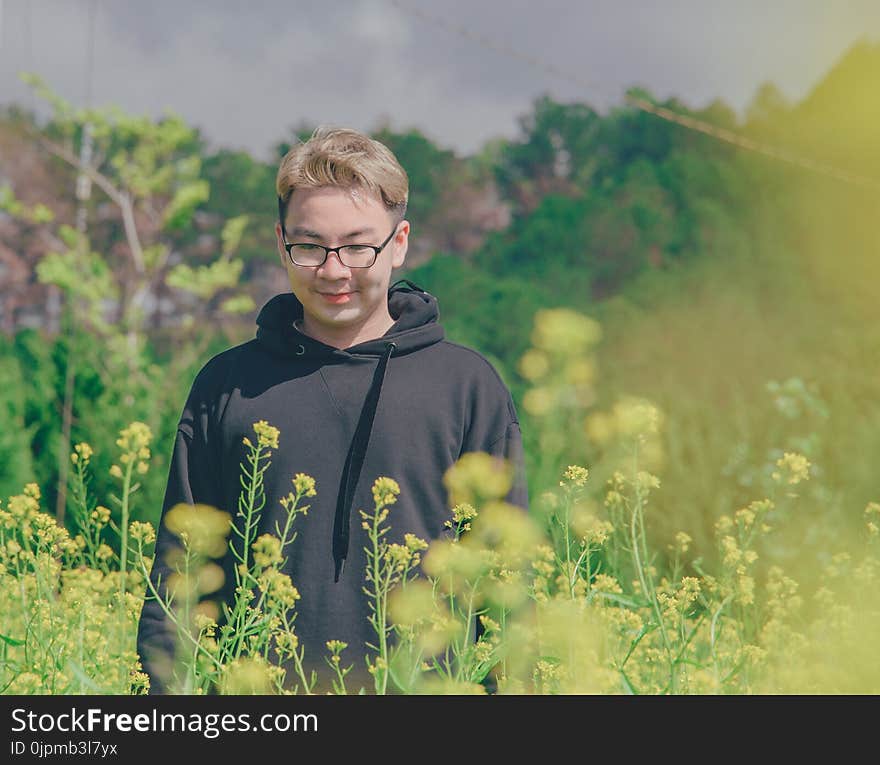 Shallow Focus Photography Of Man In Black Pullover