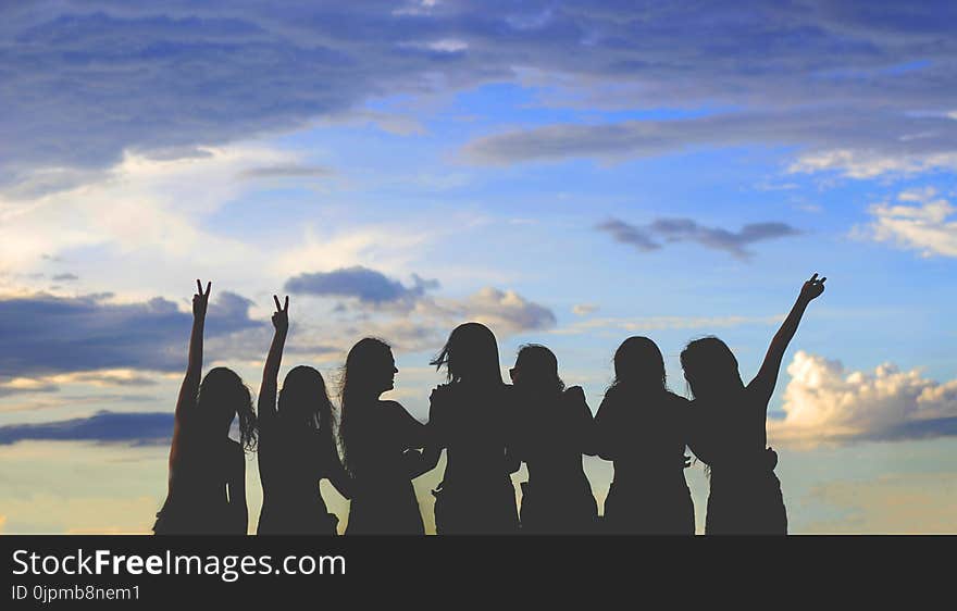 Silhouette Photo Of Women Under Blue Sky