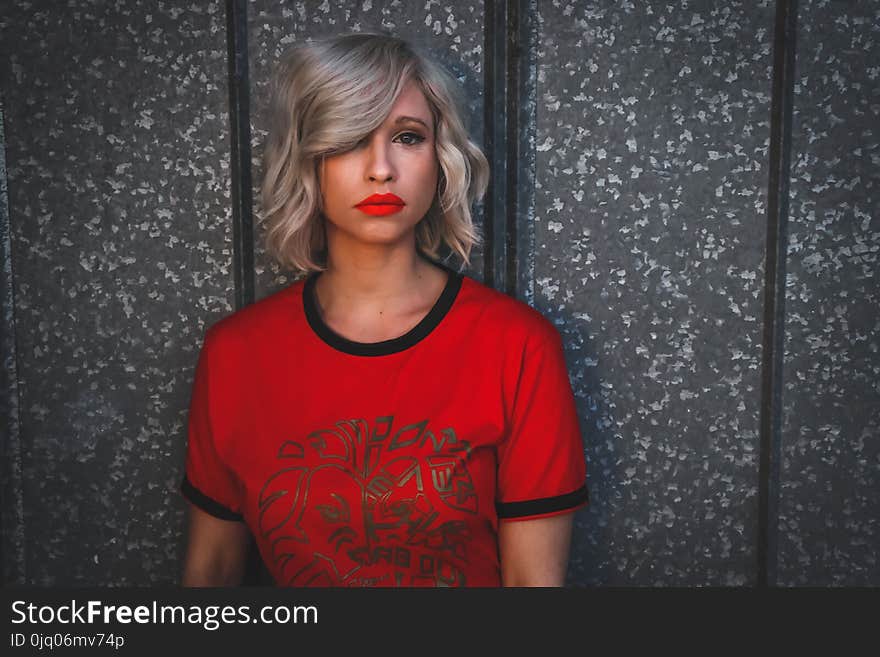 Woman Wearing Red Shirt With Red Lipstick